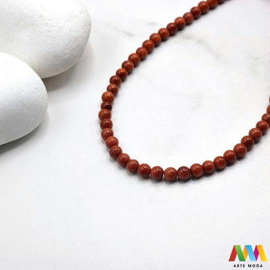 sunčev kamen poludragi sunca sunstone ljekovito kamenje kristali mineral nakit perle privjesci radost optimizam sreća energija pozitivnost meditaciju narukvica čakre prirodni sunca blistavi poludragi kamen toplom narančasto-zlatnom sjaju i inkluzijama koje podsjećaju na sunčeve zrake Sunčev kamen donosi radost optimizam i vitalnost te da pojačava osobnu snagu i karizmu izradu nakita koji zrači pozitivnom energijom i kao moćan saveznik u meditaciji za podizanje raspoloženja arte moda repromaterijal