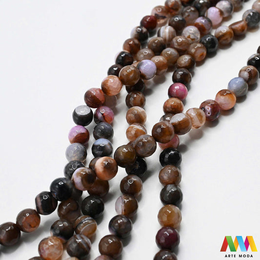 poludragi kamen ahat kristal kalcedon polu dragi poludrago kamenje dragulj mineral kvarc prirodni meditacija čakra zaštita snaga ravnoteža ljekovito perle stabilnost ahata jednog od najraznovrsnijih najljepših poludragih kamenja jedinstvenim trakama slojevima i šarenim uzorcima ahat je kamen stabilnosti uzemljenja i zaštite ahat u različitim oblicima od brušenih perli i glatkih kabošona do sirovih komada savršenih za izradu nakita meditaciju ili kao ukrasni element u vašem prostoru arte moda repromaterijal