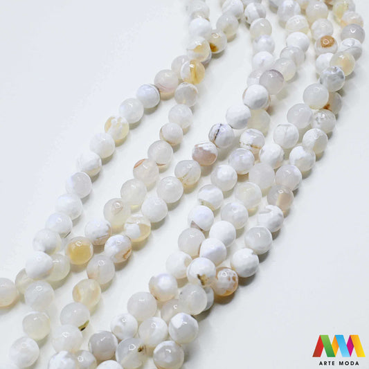 poludragi kamen ahat kristal kalcedon polu dragi poludrago kamenje dragulj mineral kvarc prirodni meditacija čakra zaštita snaga ravnoteža ljekovito perle stabilnost ahata jednog od najraznovrsnijih najljepših poludragih kamenja jedinstvenim trakama slojevima i šarenim uzorcima ahat je kamen stabilnosti uzemljenja i zaštite ahat u različitim oblicima od brušenih perli i glatkih kabošona do sirovih komada savršenih za izradu nakita meditaciju ili kao ukrasni element u vašem prostoru arte moda repromaterijal