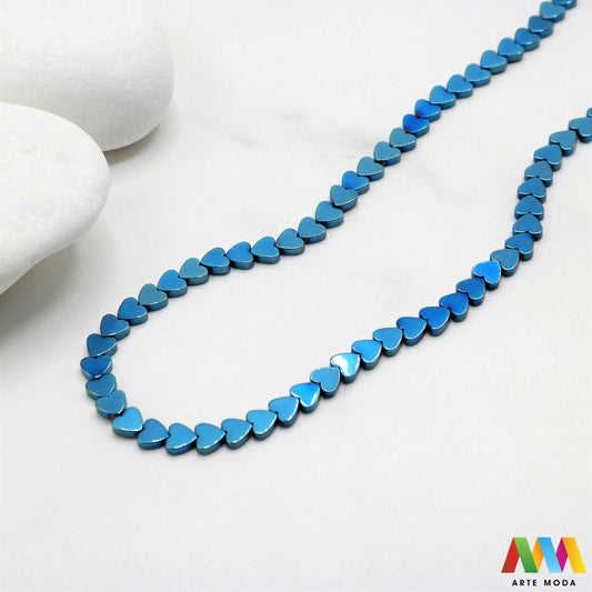 hematit krvavi kamen poludragi mineral metalni sjaj kvarc zrcalo kristal prirodni metalik meditacija zaštita repromaterijal Hematit (ili krvavi kamen) je prirodni mineral smeđe sive ili crne boje karakteriziran prisustvom hladnog metalnog sjaja Vjeruje se da pomaže u jačanju volje samopouzdanja i povezanosti s majkom zemljom Nakit izrađen od njega fascinira svojim tajanstvenim zrcalnim sjajem