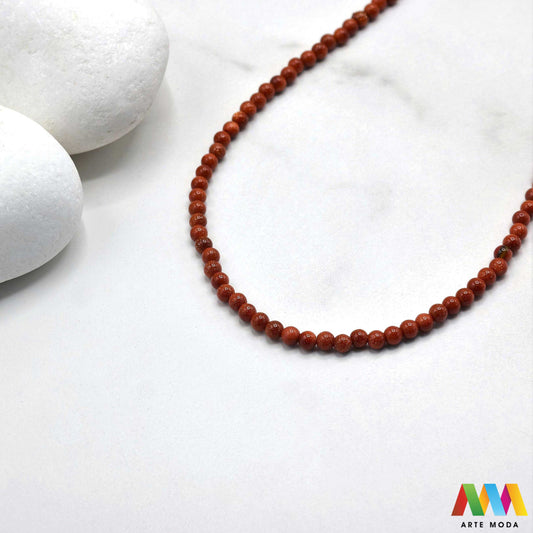 sunčev kamen poludragi sunca sunstone ljekovito kamenje kristali mineral nakit perle privjesci radost optimizam sreća energija pozitivnost meditaciju narukvica čakre prirodni sunca blistavi poludragi kamen toplom narančasto-zlatnom sjaju i inkluzijama koje podsjećaju na sunčeve zrake Sunčev kamen donosi radost optimizam i vitalnost te da pojačava osobnu snagu i karizmu izradu nakita koji zrači pozitivnom energijom i kao moćan saveznik u meditaciji za podizanje raspoloženja arte moda repromaterijal