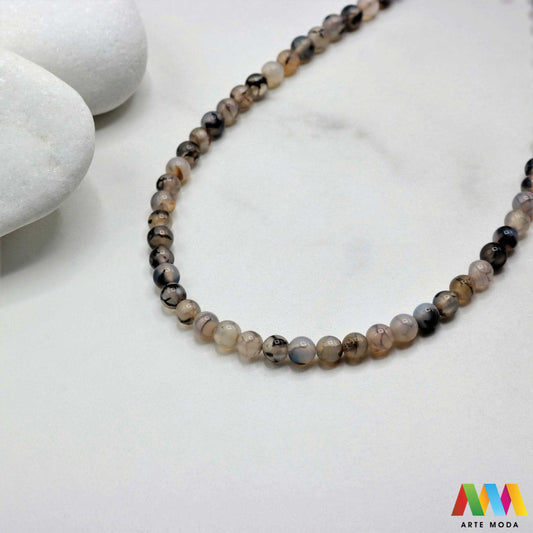 poludragi kamen ahat kristal kalcedon polu dragi poludrago kamenje dragulj mineral kvarc prirodni meditacija čakra zaštita snaga ravnoteža ljekovito perle stabilnost ahata jednog od najraznovrsnijih najljepših poludragih kamenja jedinstvenim trakama slojevima i šarenim uzorcima ahat je kamen stabilnosti uzemljenja i zaštite ahat u različitim oblicima od brušenih perli i glatkih kabošona do sirovih komada savršenih za izradu nakita meditaciju ili kao ukrasni element u vašem prostoru arte moda repromaterijal